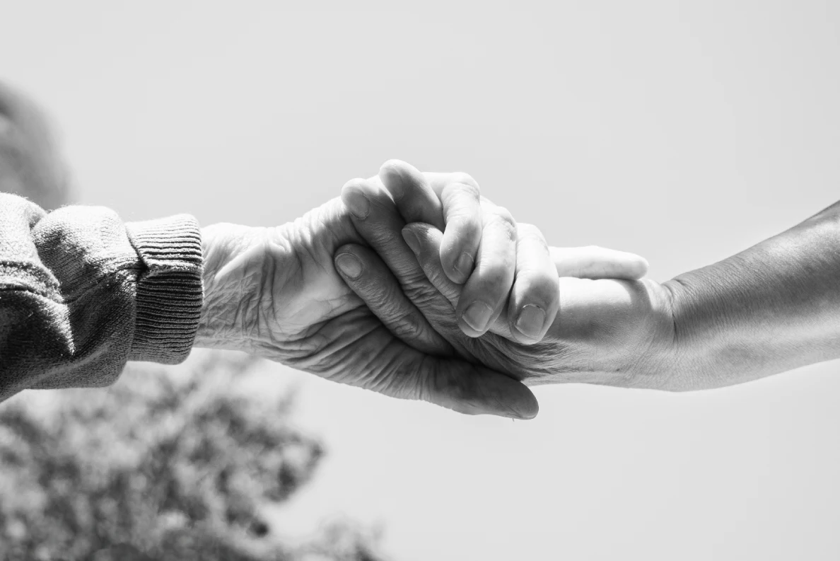 Two people shaking hands.