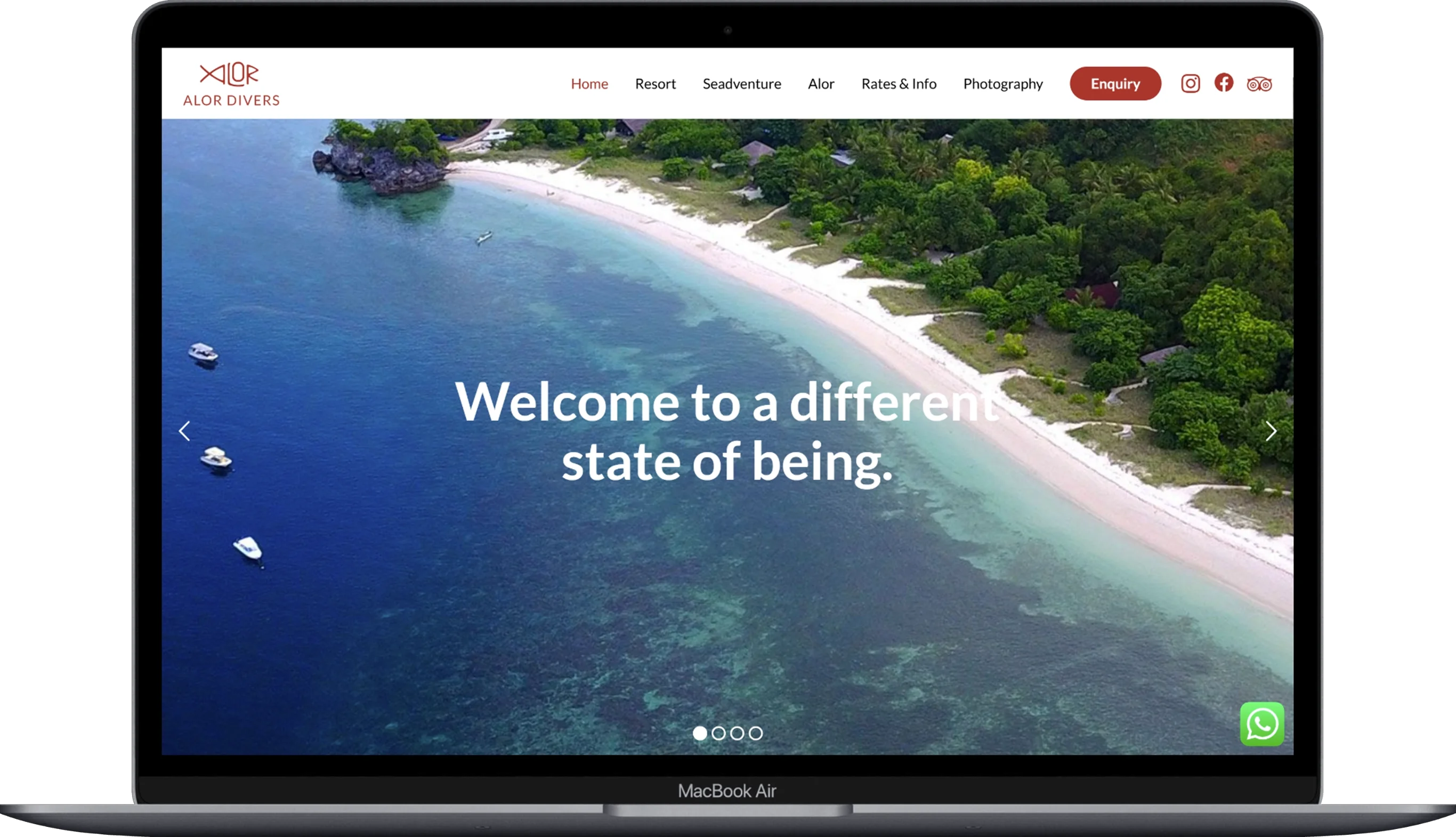 The page of the Alor Divers website displayed on a laptop.