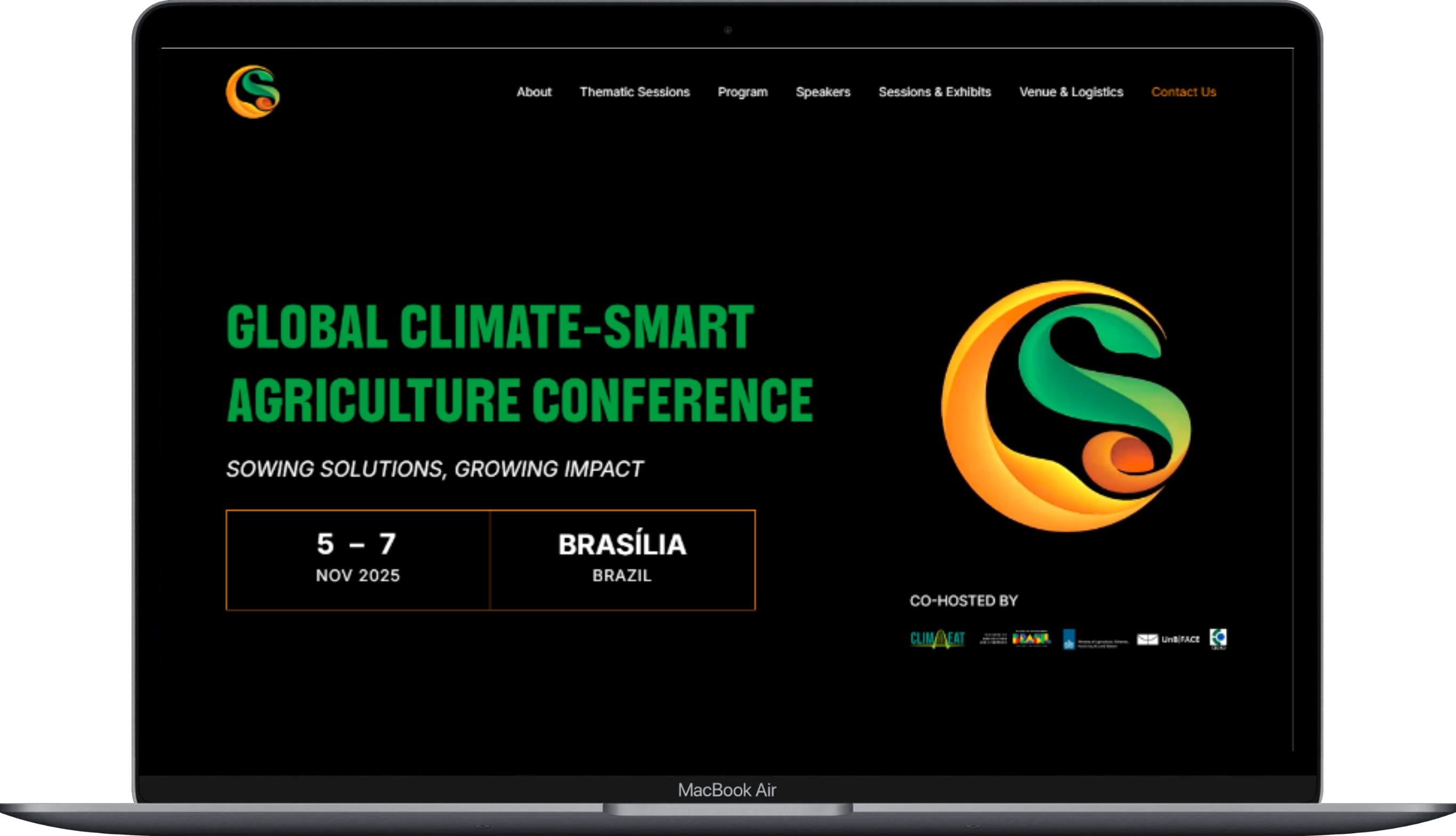 The page of the Global CSA Conference website displayed on a laptop.