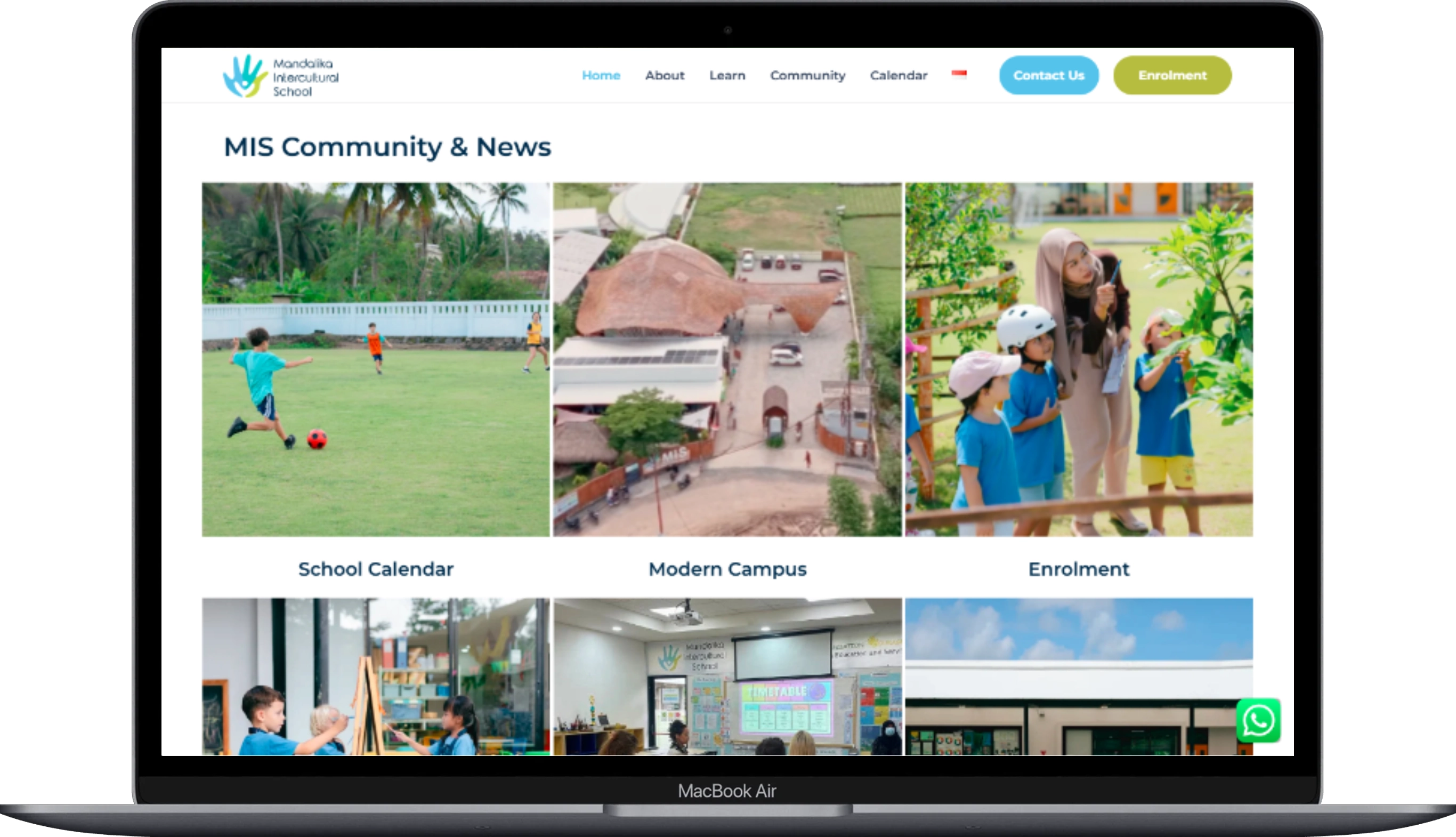 The page of the Mandalika Intercultural School website displayed on a laptop.