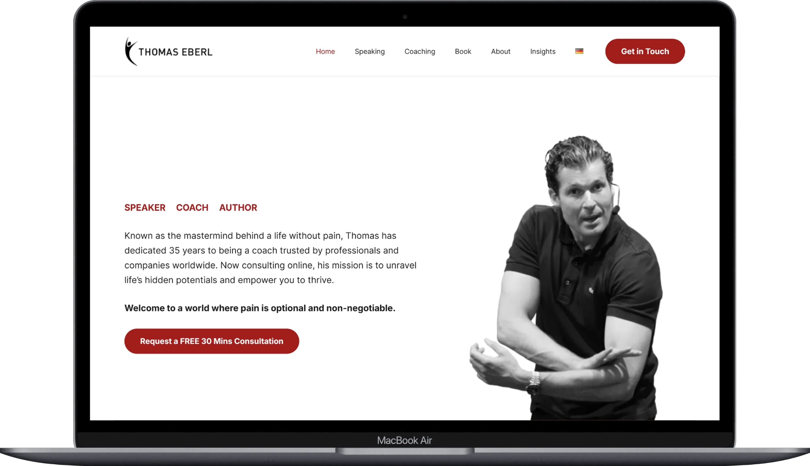 The page of the thomas-eberl website displayed on a laptop.