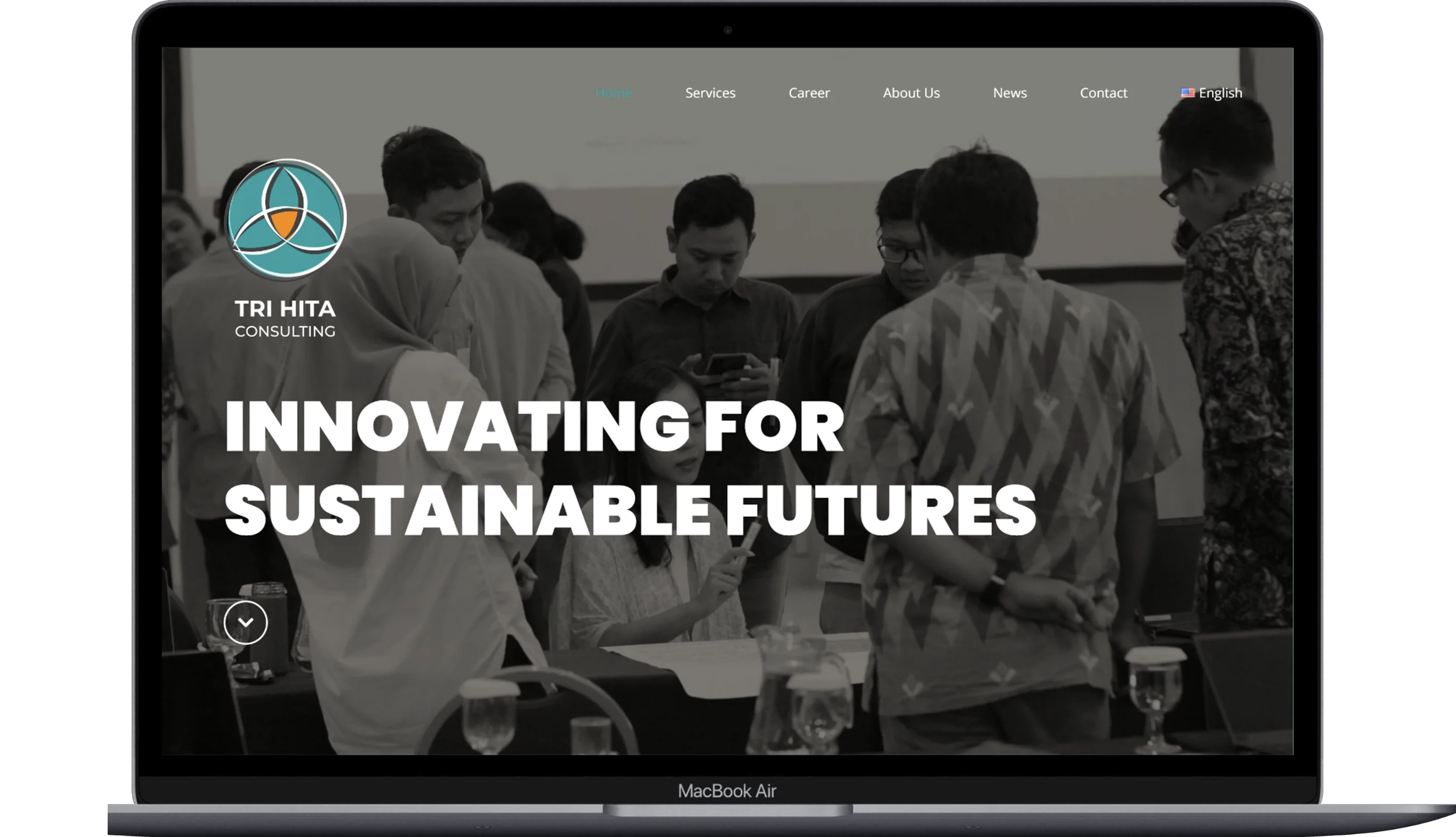 The page of the trihita website displayed on a laptop.
