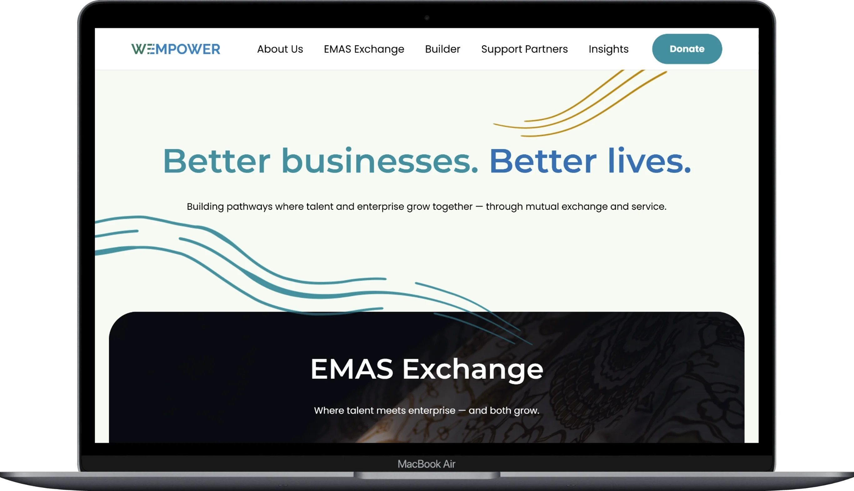 Contact Us page of the we-empower website displayed on a laptop.