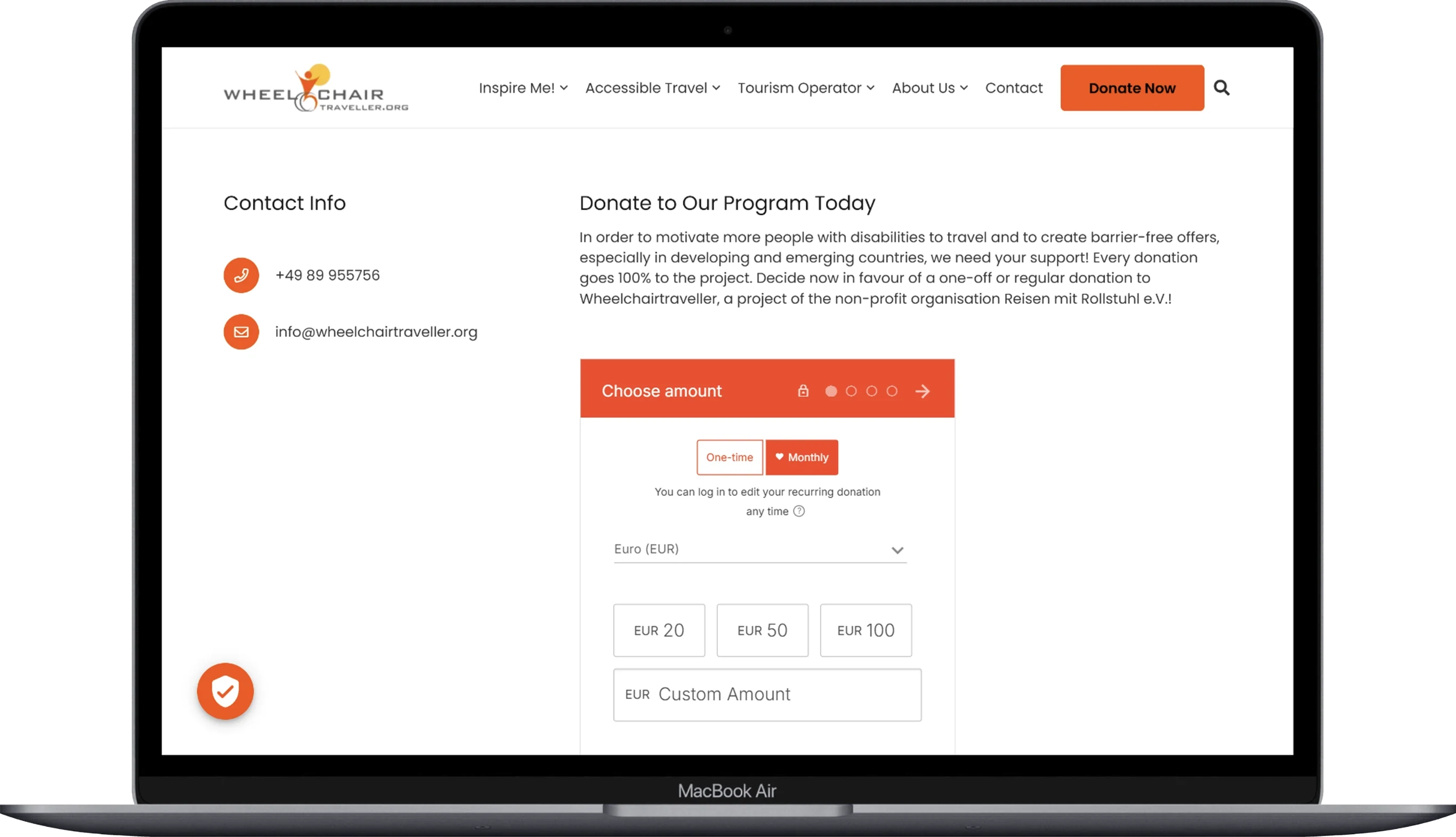 Contact Us page of the wheel-chair website displayed on a laptop.